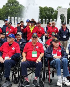 Dan Barden with fellow Veterans at the WWII Memorial Atlantic Theater fountain
