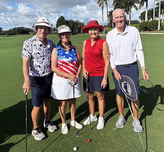 Dan and Linda McDaniel, Char Wingert and Jim Reid on the golf course