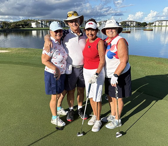 Bonnie Mullee, John Vuncannon, Mari Lou McCann and Ginny Tucker beside the lake