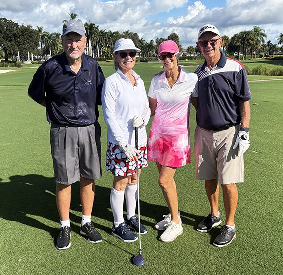 Jon and Lori Swanell with Linda and Dennis Calhoun on the course