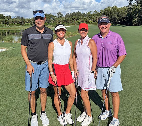 Matt and Kelly Welborn with Tricia and Mike Seibert on the fairway