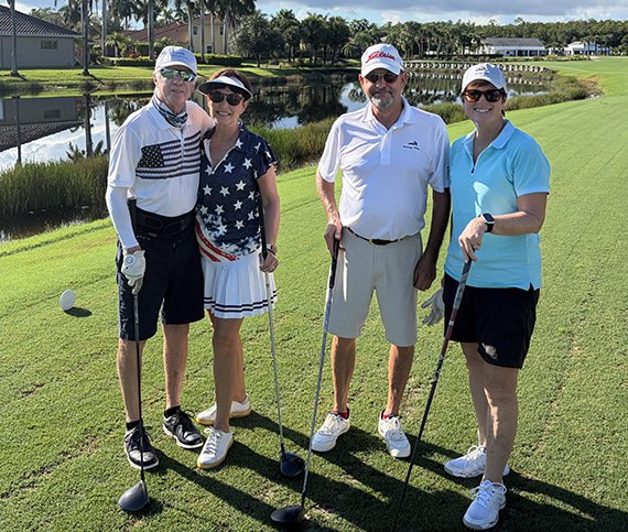 Terry and Cheryl McPolin with Dan Becker and Cathy White by the water