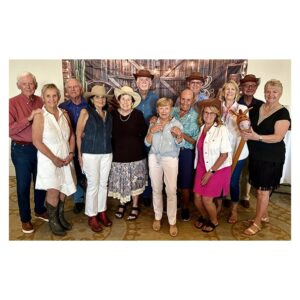 Heritage Palms members in western wear at the Boots and Barrels dinner dance