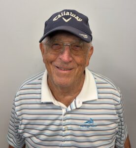 Chuck Schmitz in a Callaway cap and Heritage Palms golf shirt