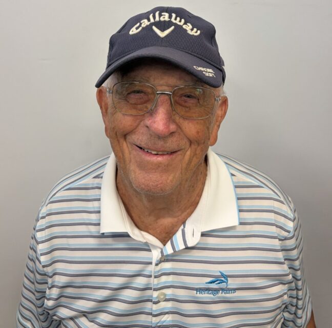 Chuck Schmitz in a Callaway cap and Heritage Palms golf shirt