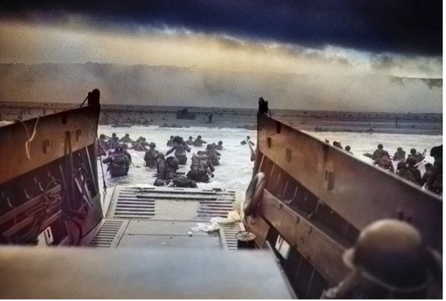 Allied troops wading ashore from a landing craft on D-Day